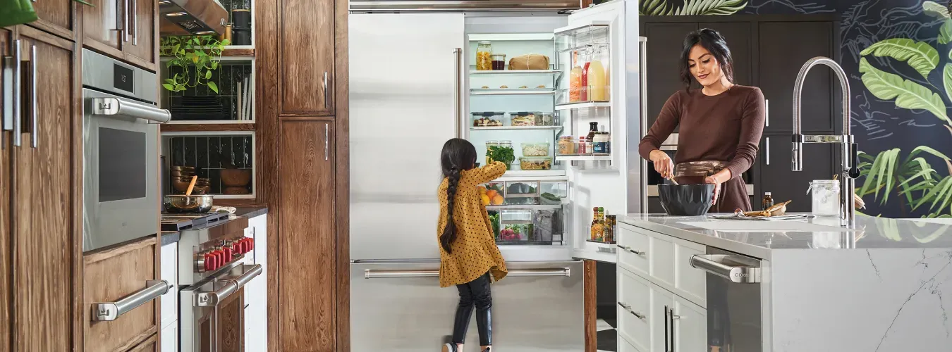 mom-and-daughter-open-sub-zero-refrigerator